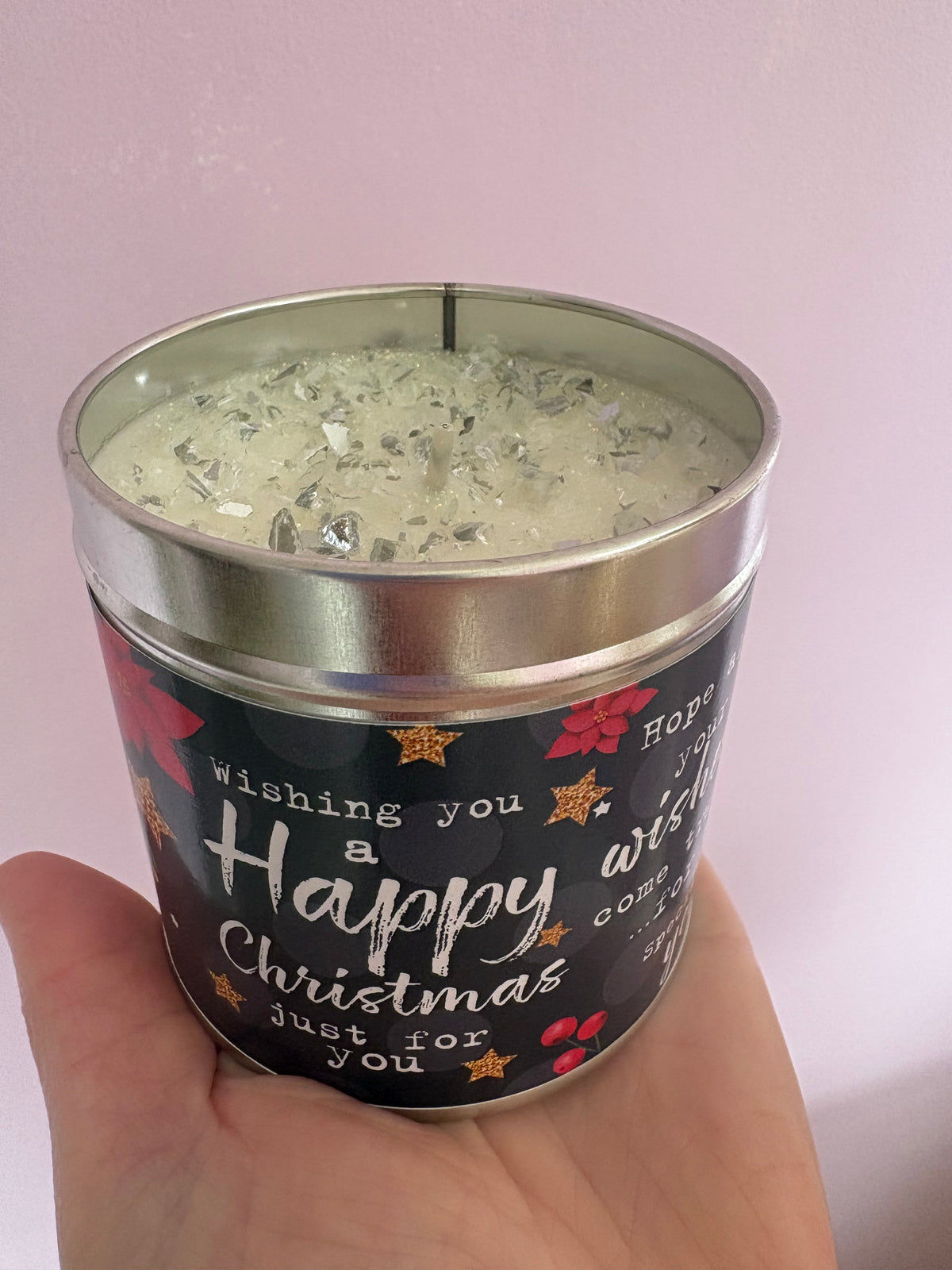 Happy Christmas cranberries and orange candle