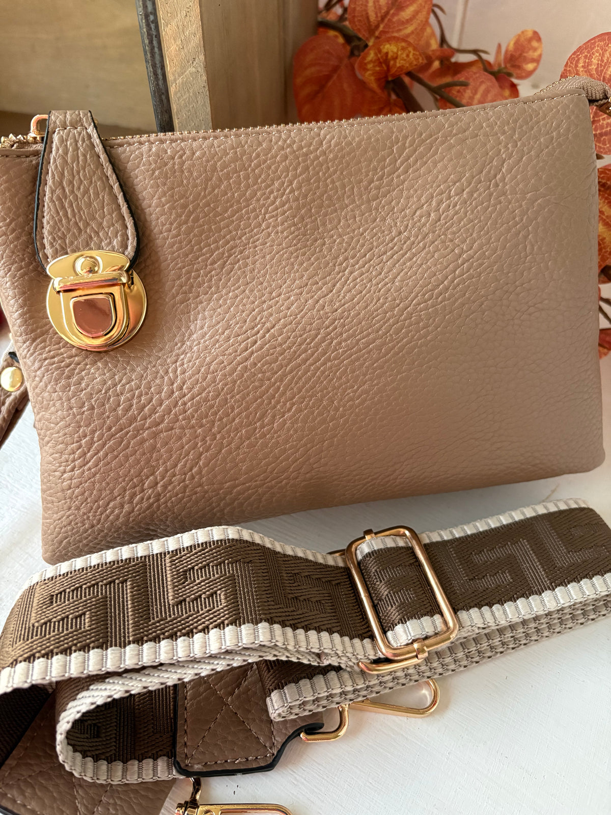 Cross body gold buckle bag