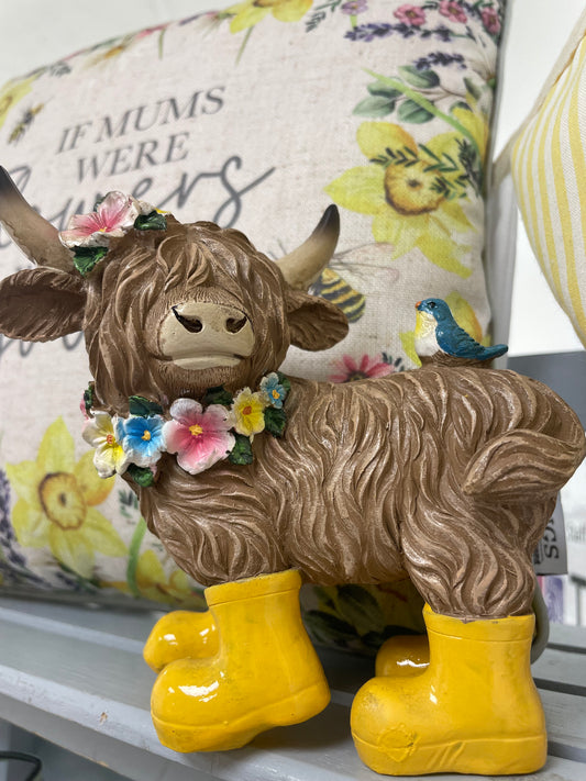Springtime highland cow