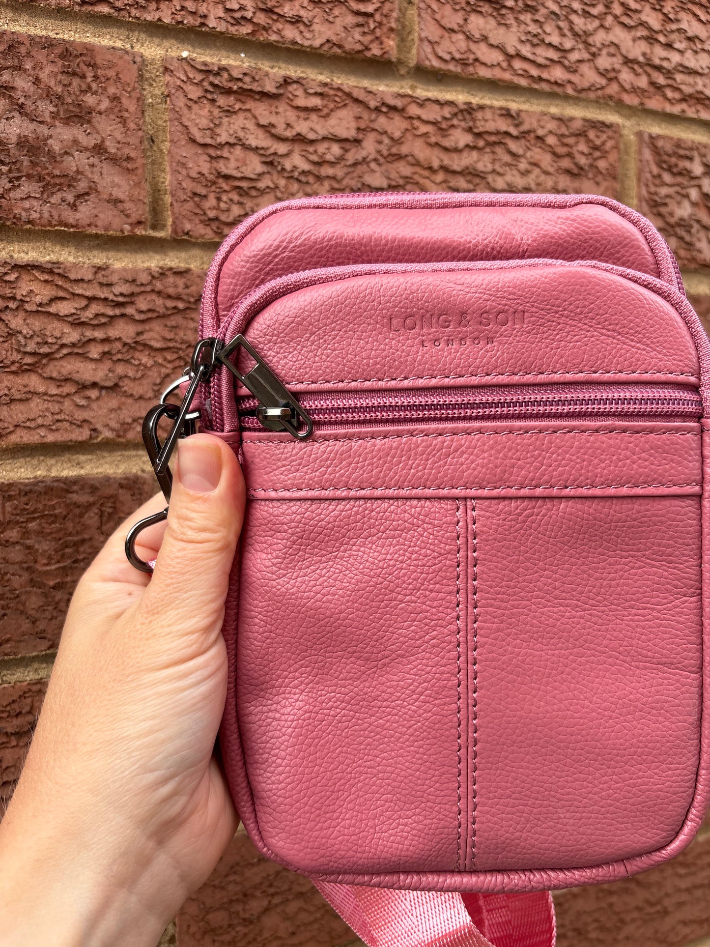 Leather style cross body bag zipped compartments pink colour