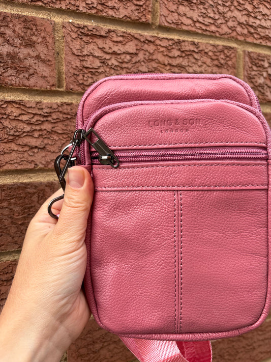 Leather style cross body bag zipped compartments pink colour