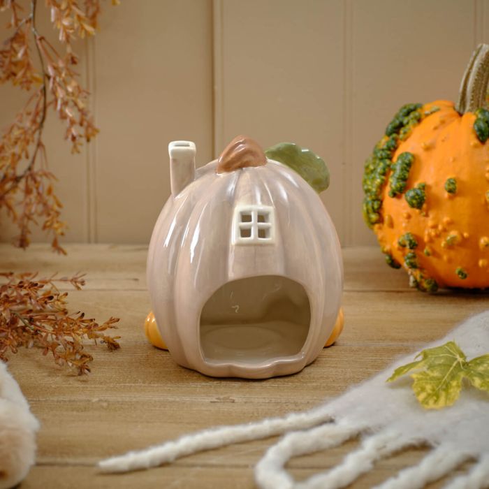 Harvest home shaped pumpkin candle house