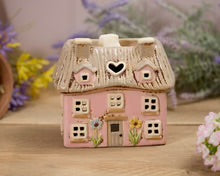 Heart cottage village pottery house