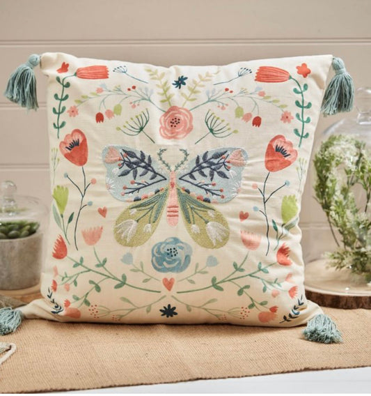 Bright butterfly cushion with embroidery and tassels