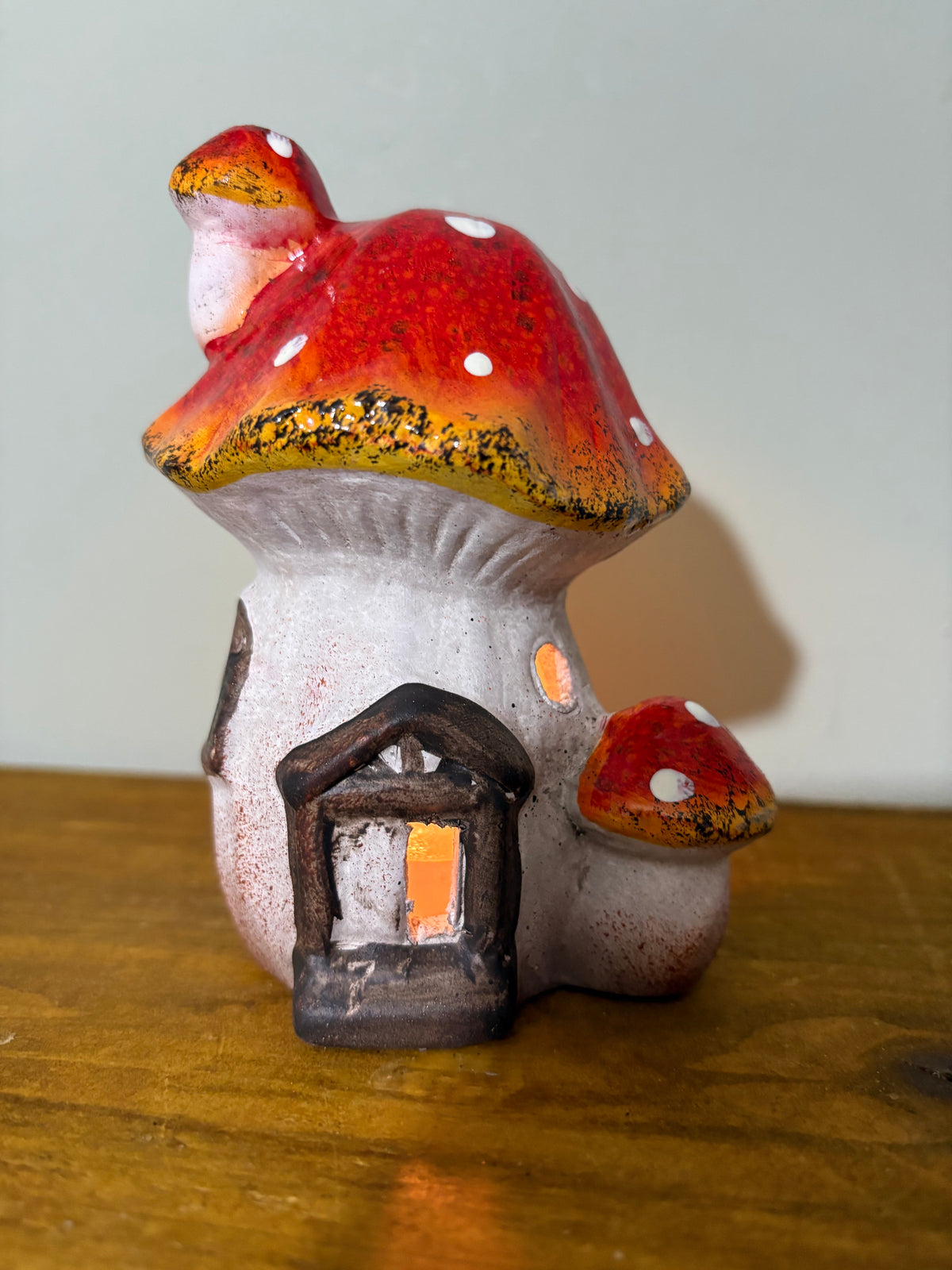 Toadstool candle house candle holder