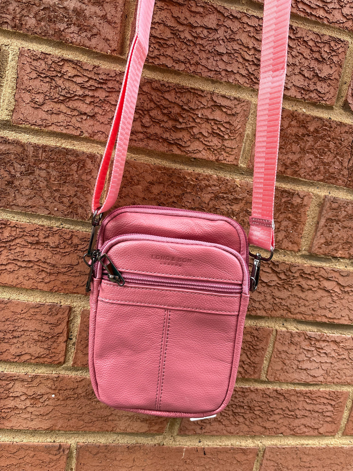 Leather style cross body bag zipped compartments pink colour