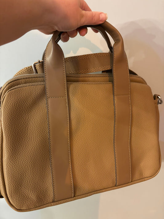 Hand held bag with zipped compartments and strap
